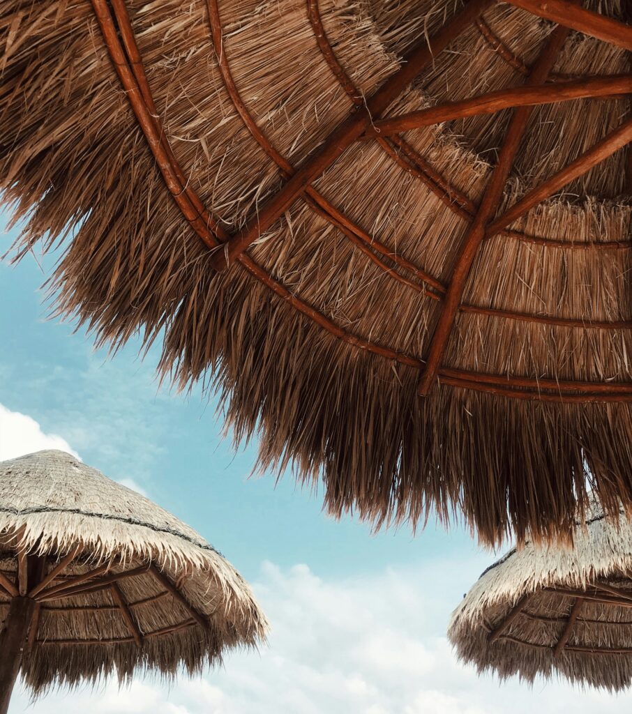 straw umbrellas on the beach